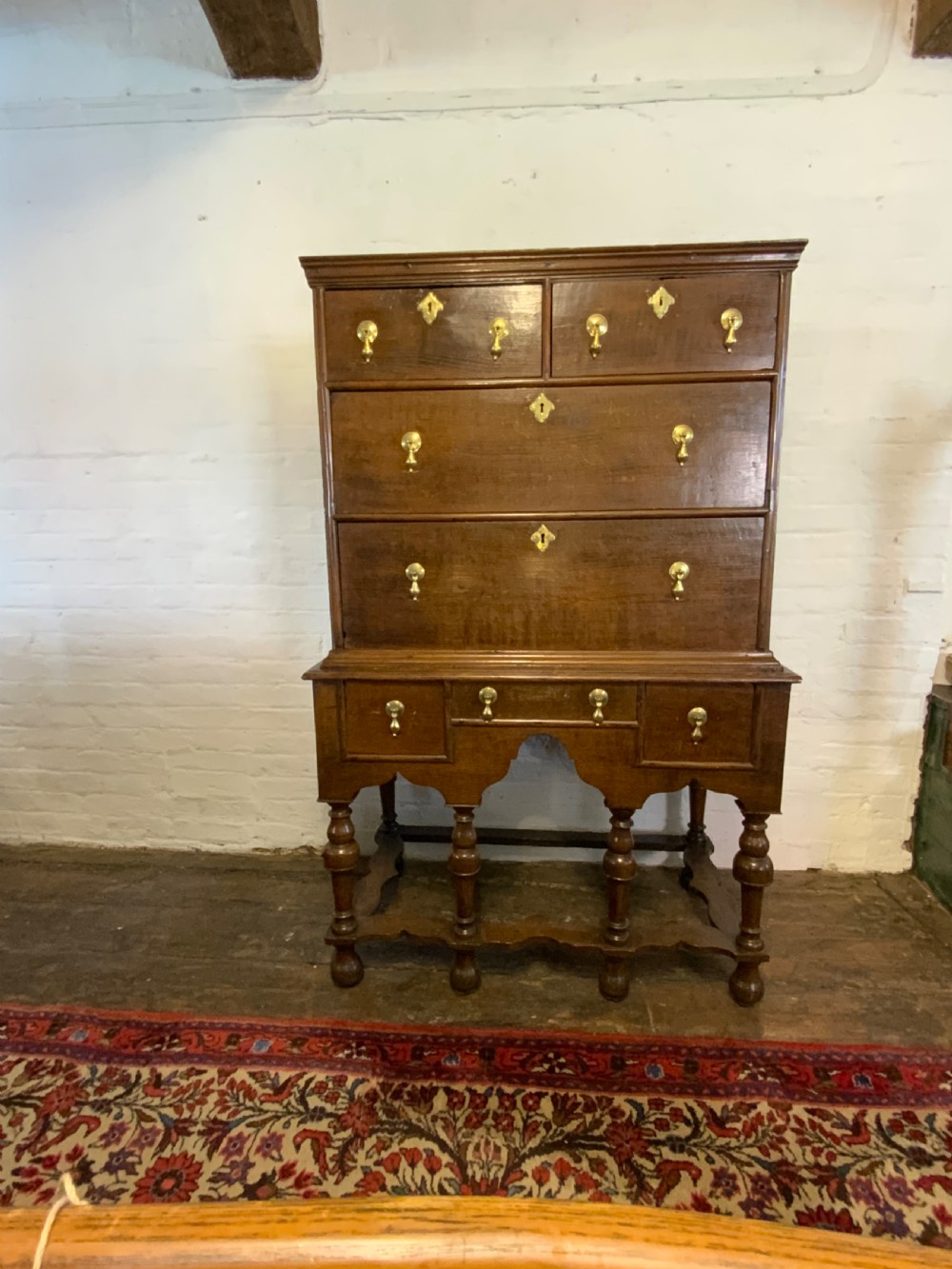 A Queen Anne period oak chest on stand View VIII