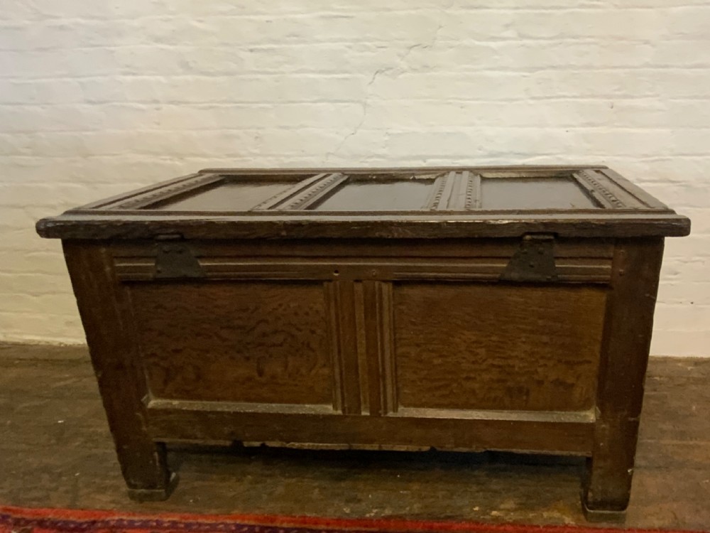 A small James I period oak coffer View VIII