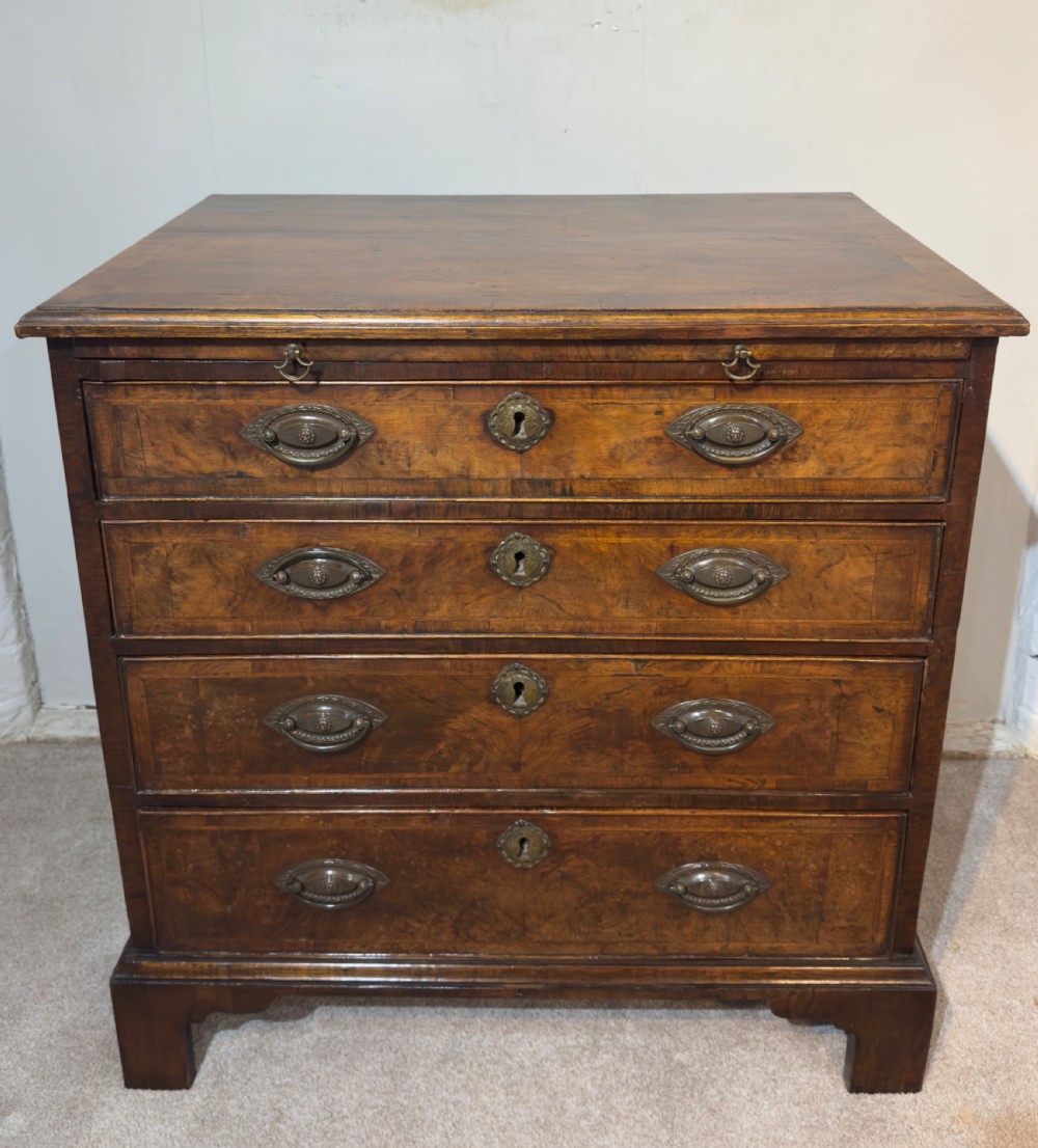 An 18th century walnut bachelors chest.