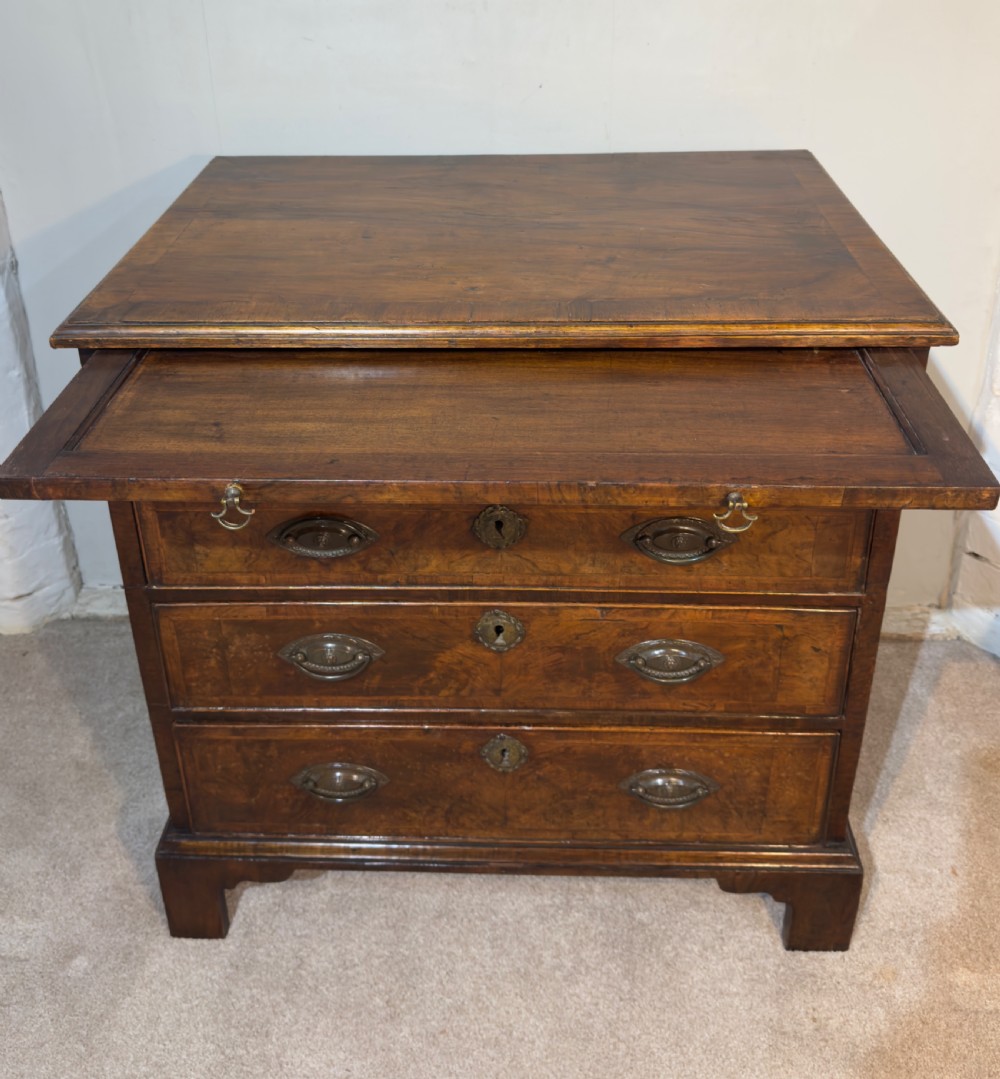 An 18th century walnut bachelors chest. View II