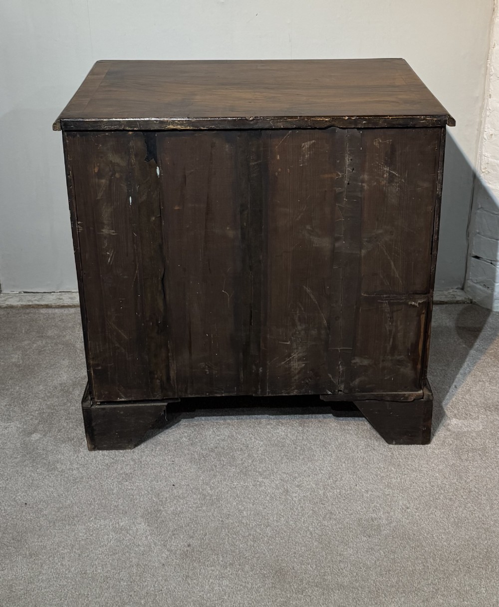 An 18th century walnut bachelors chest. View VI