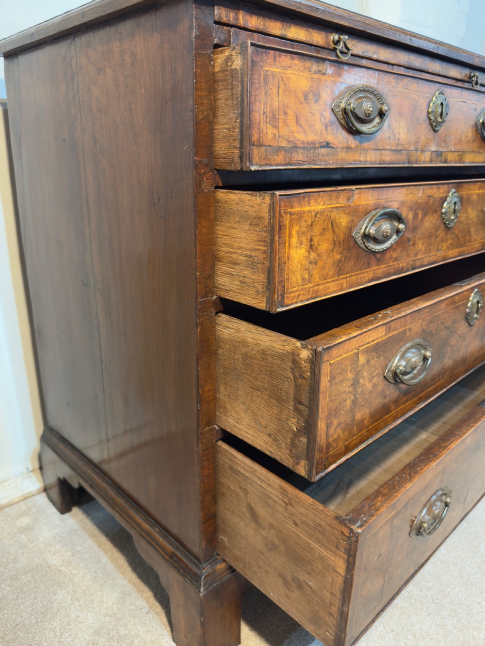 An 18th century walnut bachelors chest. View VII
