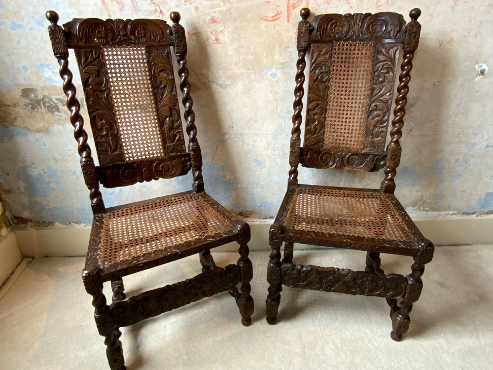 A pair of charles II walnut side chairs