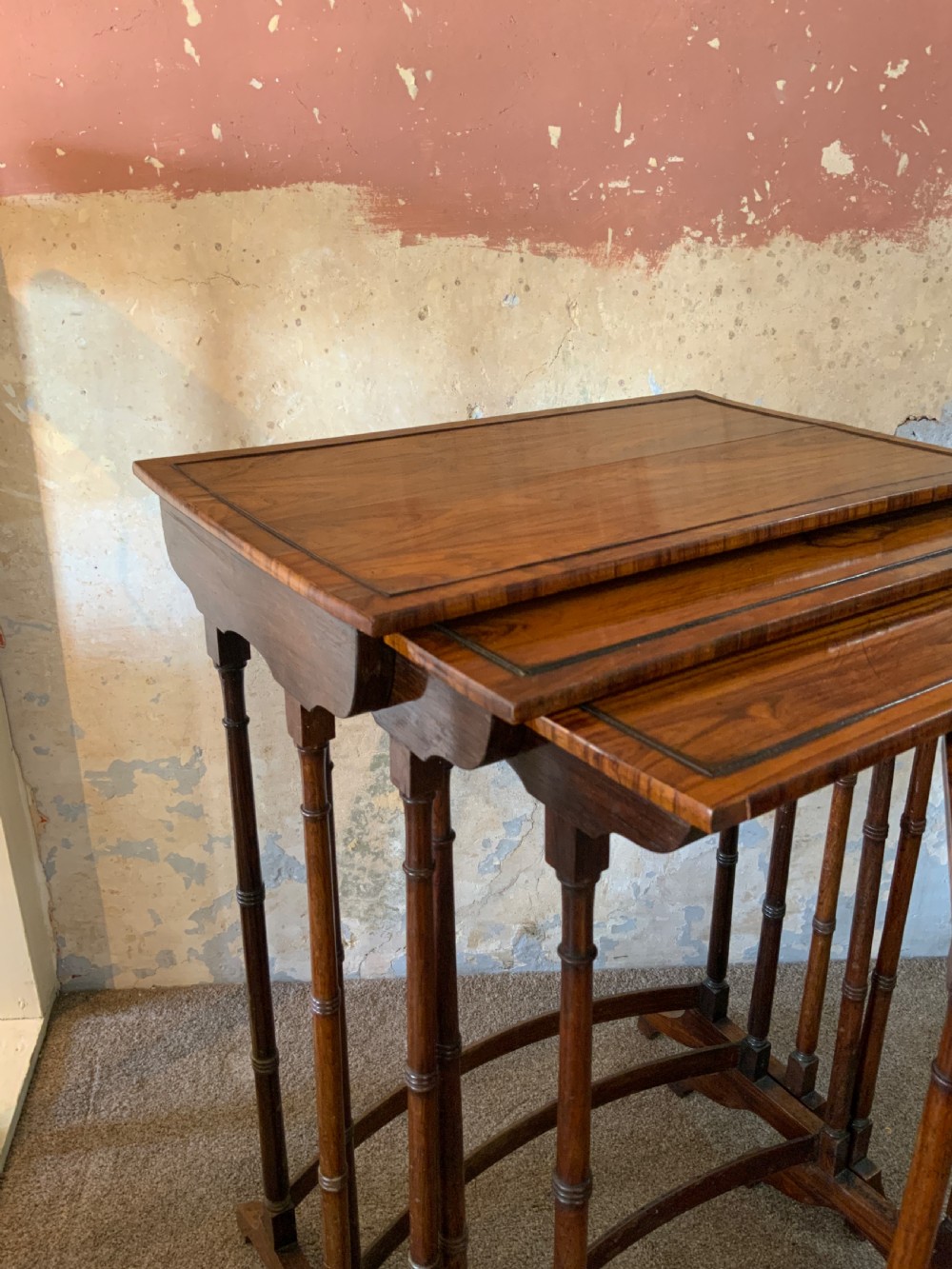 Nest of four Regency rosewood tables View VI