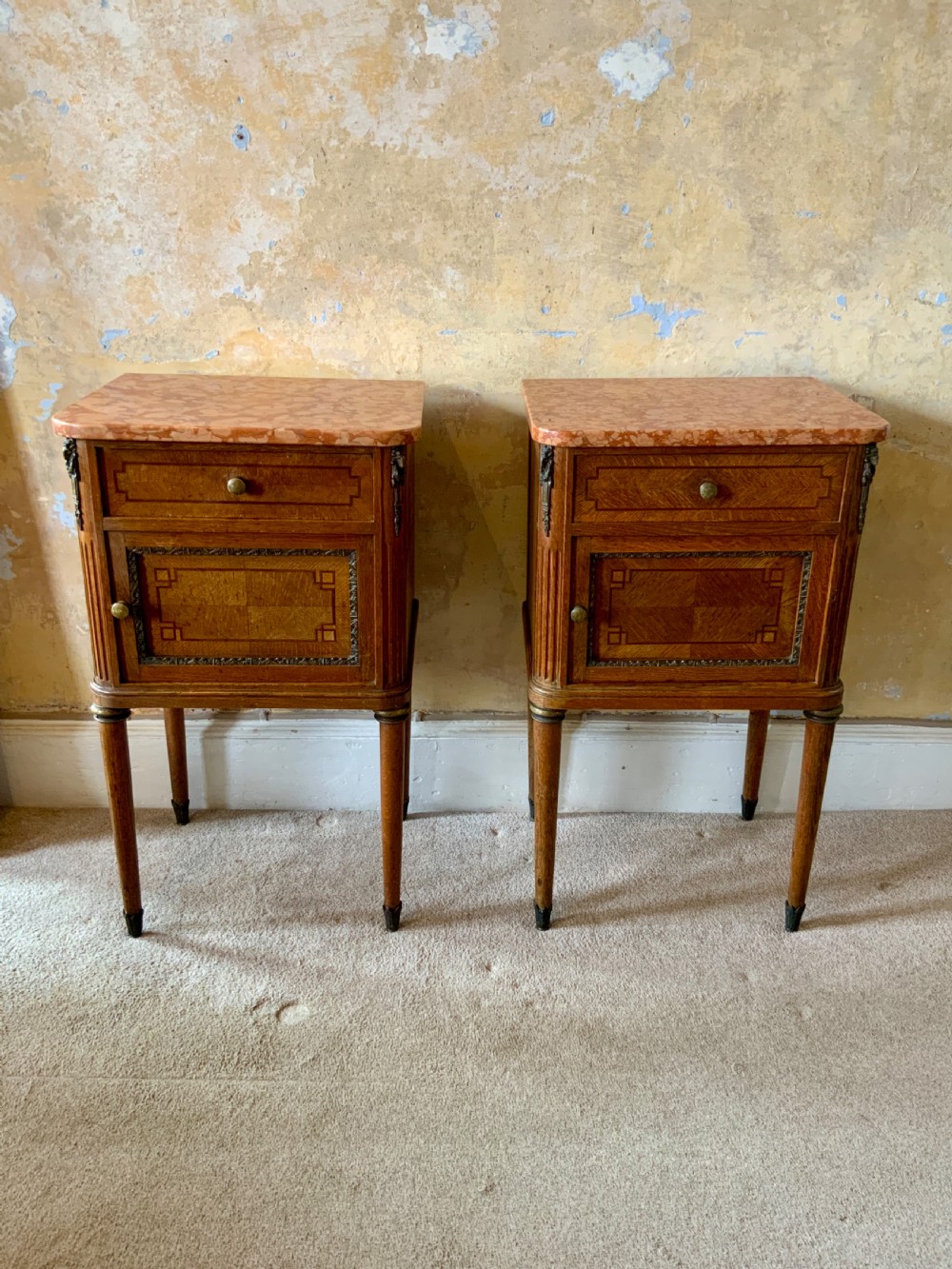 Pair of marble topped bedside cabinets View II