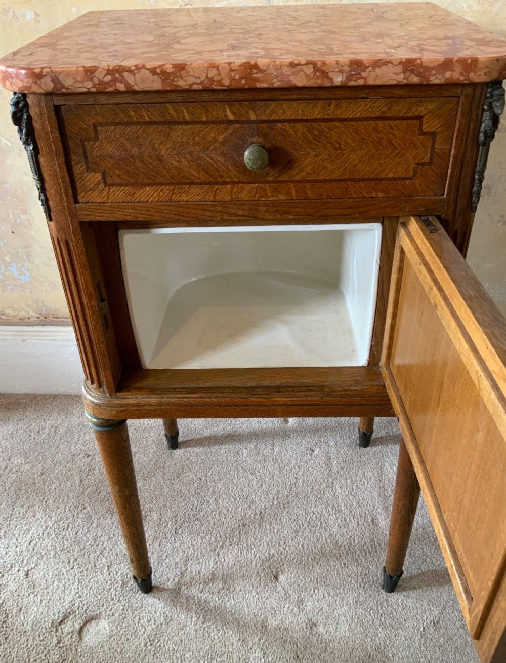 Pair of marble topped bedside cabinets View IX