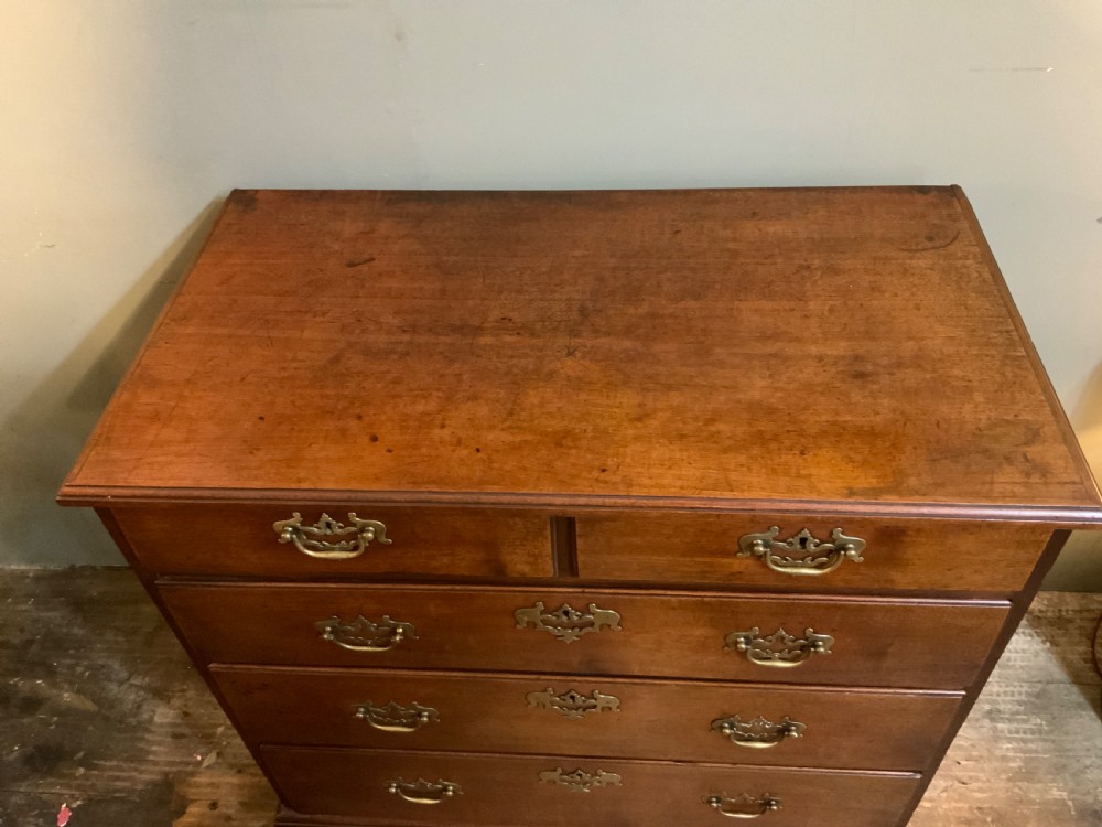 A George II period mahogany chest of drawers View V