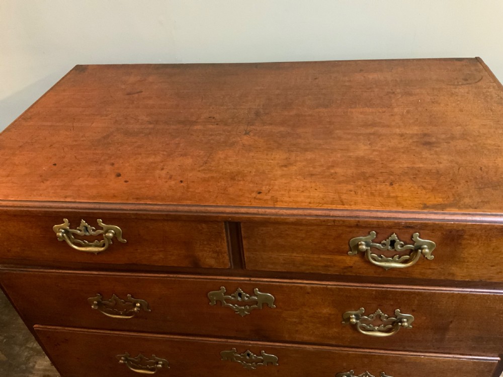 A George II period mahogany chest of drawers View VI