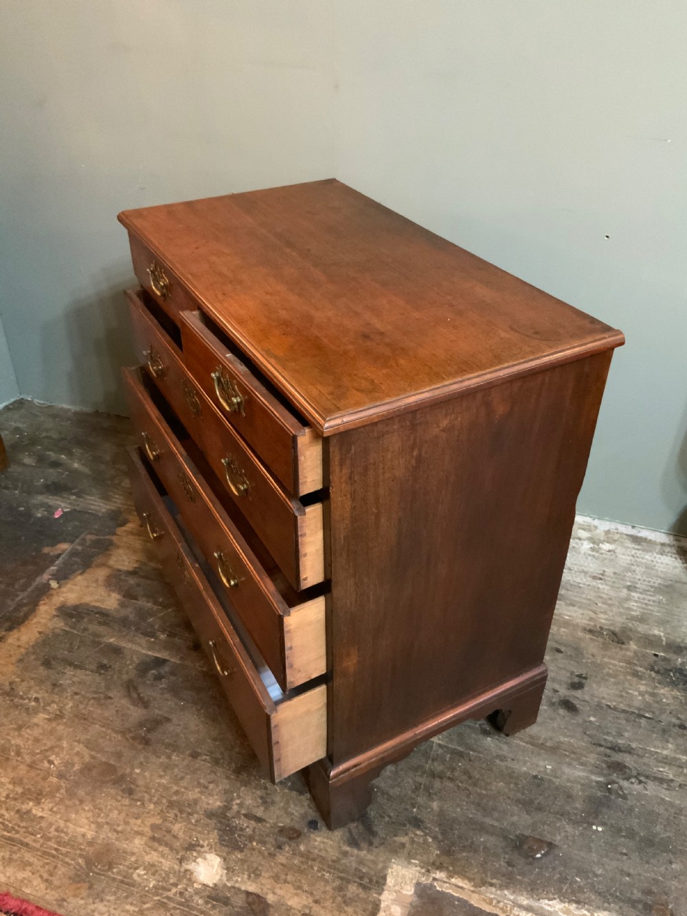 A George II period mahogany chest of drawers View VII