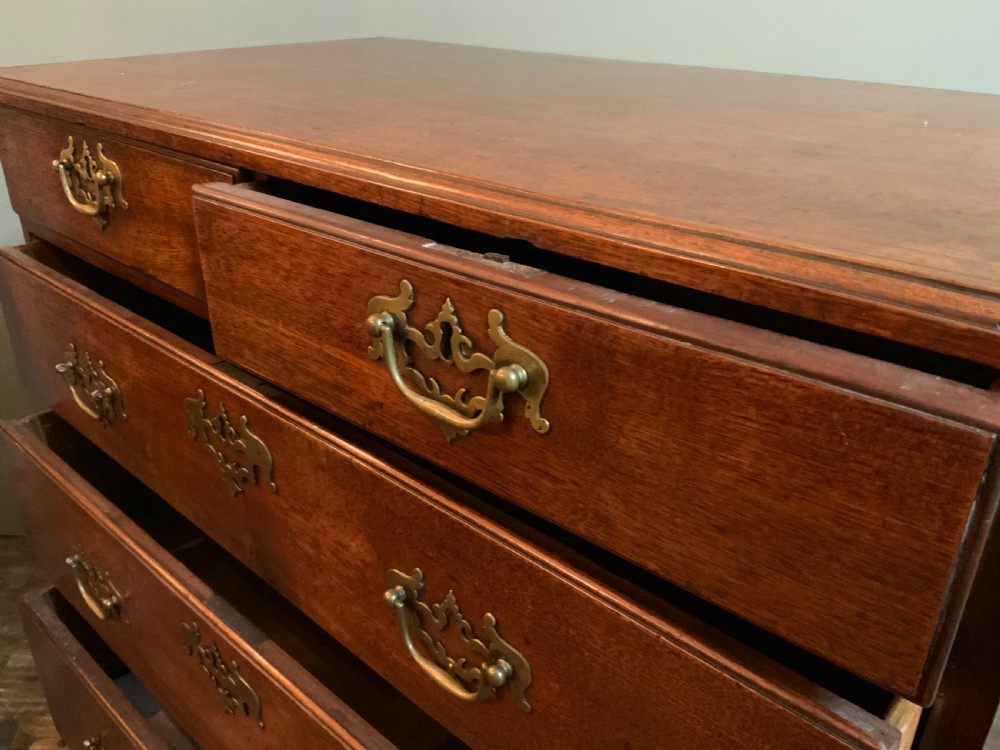 A George II period mahogany chest of drawers View VIII