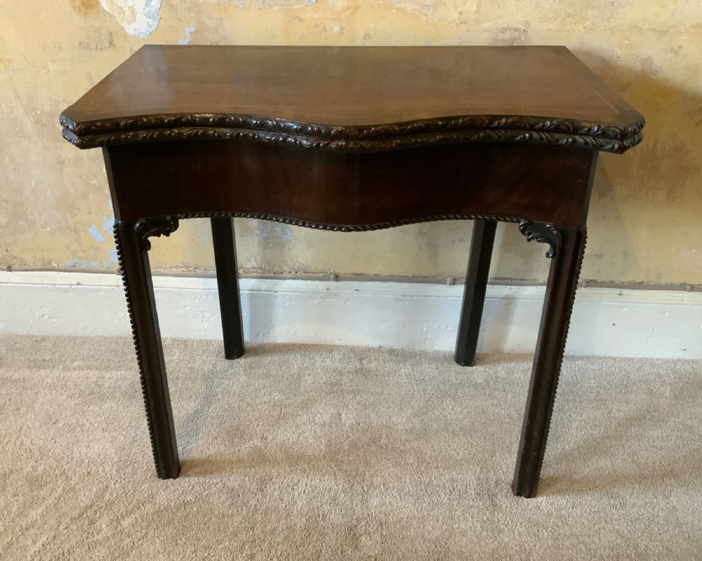 A Chippendale period games table View II