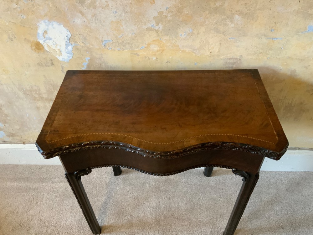 A Chippendale period games table View III