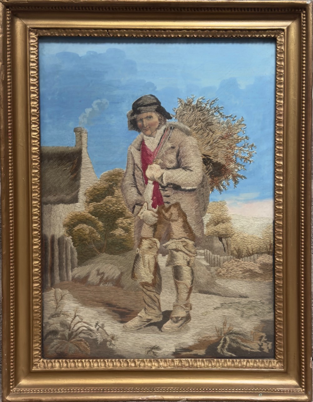 An antique late Regency long stitch silk embroidery depicting a country huntsman with his dog, framed in an ornate giltwood frame. View II