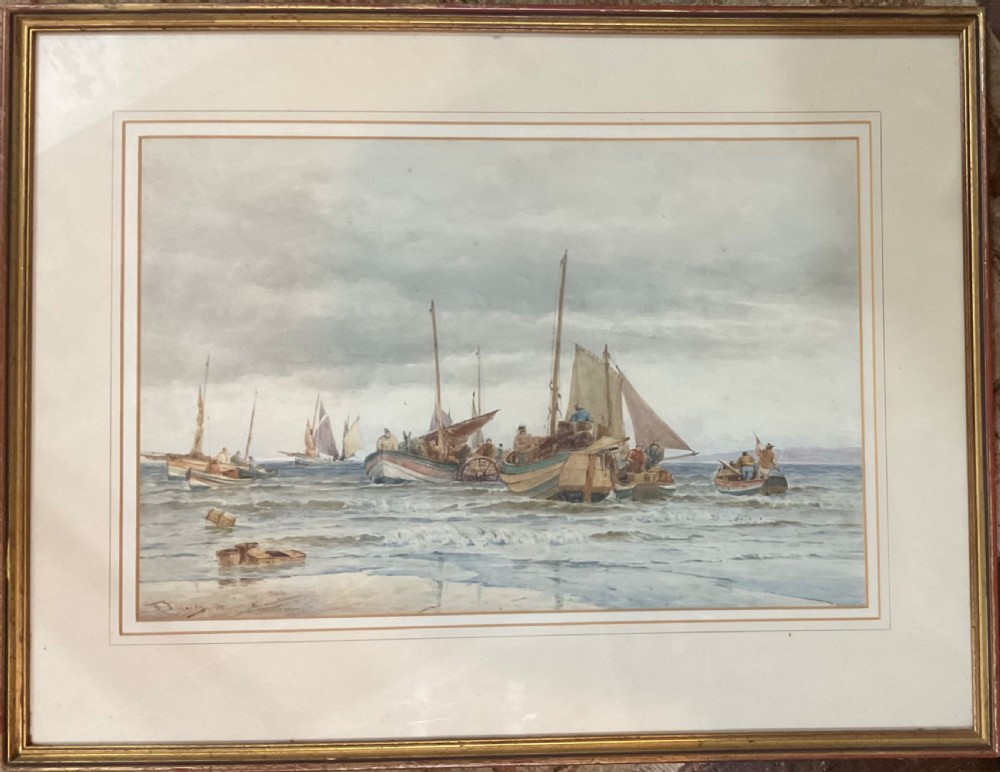 A framed Victorian watercolour painting depicting multiple wooden fishing boats navigating coastal waves under a clouded grey sky.