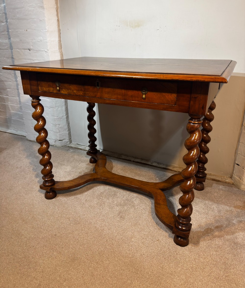 A 19th century walnut side table