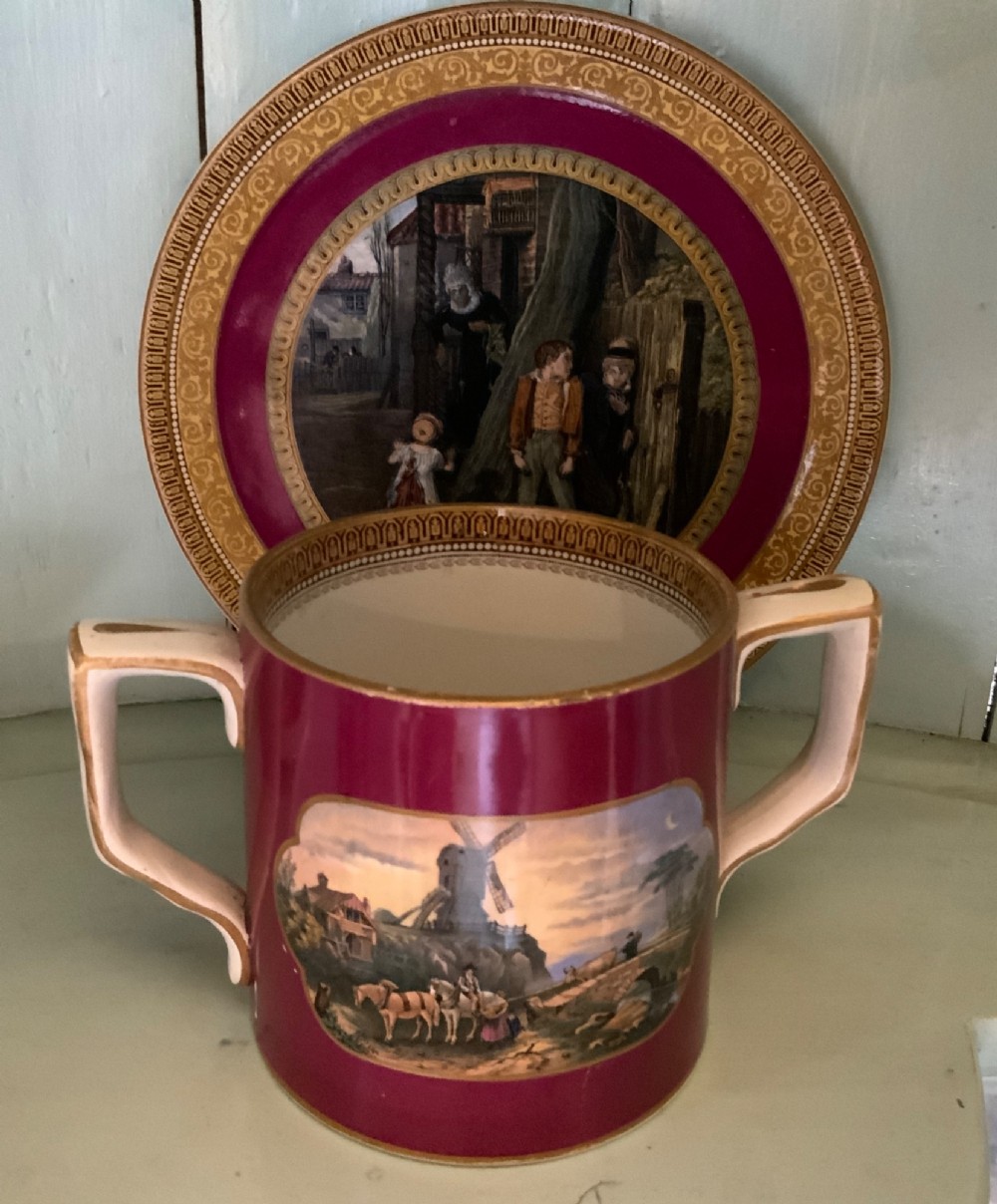 A twelve-piece collection of Victorian English Staffordshire Prattware ceramics including plates, mugs, and dishes with transfer-printed pictorial scenes and pink and gold borders. View IV