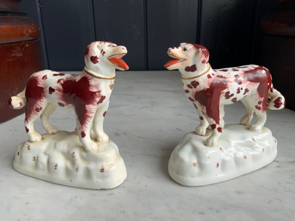 Pair of Staffordshire porcelain dogs