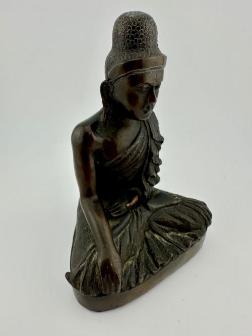 fig 5. A 19th-century Burmese cast bronze seated Shakyamuni Buddha statue depicting the Bhumisparsha mudra with a dark patinated finish.