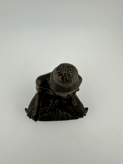 fig 9. A 19th-century Burmese cast bronze seated Shakyamuni Buddha statue depicting the Bhumisparsha mudra with a dark patinated finish.