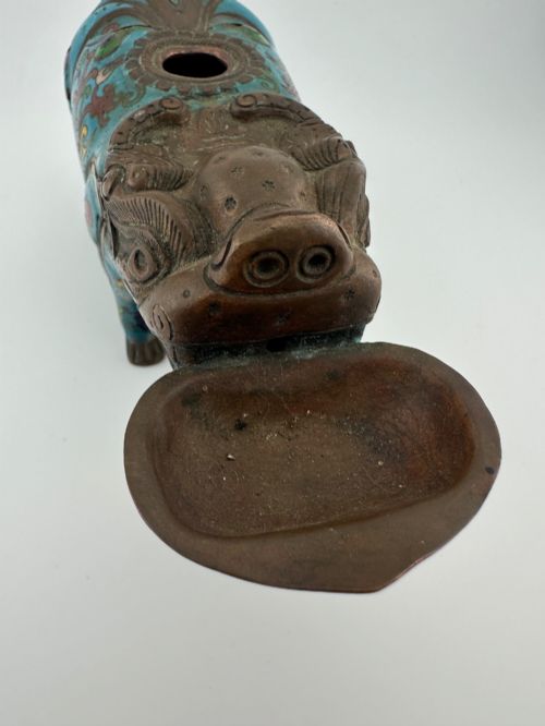 fig 1. An antique Chinese bronze censer shaped as a mythical beast decorated with turquoise cloisonne enamel and colourful scrollwork.
