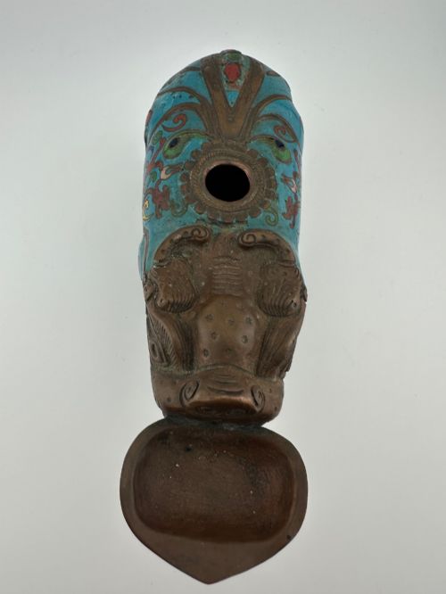 fig 3. An antique Chinese bronze censer shaped as a mythical beast decorated with turquoise cloisonne enamel and colourful scrollwork.