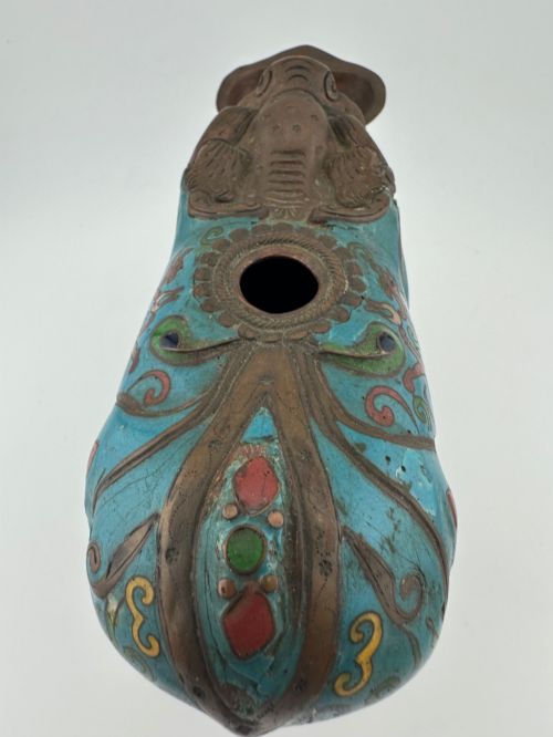 fig 5. An antique Chinese bronze censer shaped as a mythical beast decorated with turquoise cloisonne enamel and colourful scrollwork.