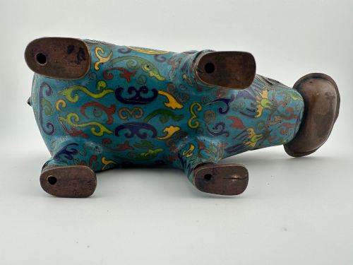 fig 7. An antique Chinese bronze censer shaped as a mythical beast decorated with turquoise cloisonne enamel and colourful scrollwork.