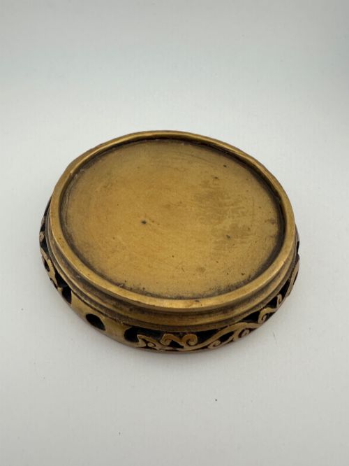 fig 9. An antique gilded bronze Chinese censer featuring hardstone and jade cabochon inlays, beast-head handles, a pierced cover, and a matching carved stand.
