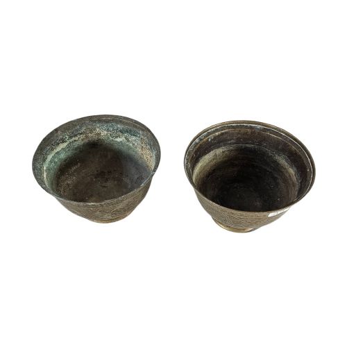 fig 1. A pair of antique Chinese cast bronze footed bowls decorated with etched bird and lotus leaf motifs beneath key-fret rim borders.