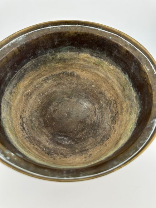 fig 4. A pair of antique Chinese cast bronze footed bowls decorated with etched bird and lotus leaf motifs beneath key-fret rim borders.
