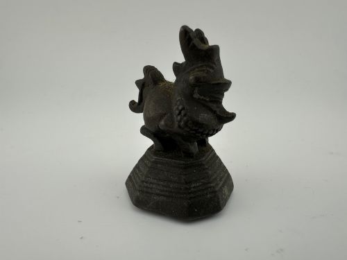 fig 5. A set of six dark bronze zoomorphic trade weights depicting various animals mounted on octagonal and circular pedestals.