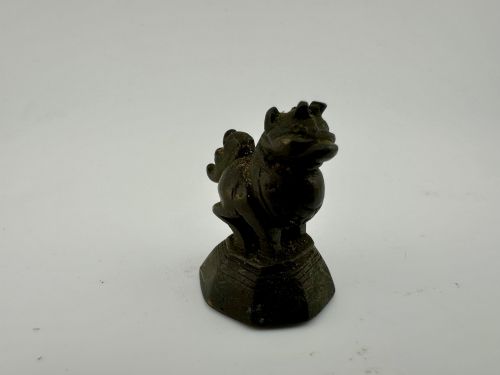 fig 7. A set of six dark bronze zoomorphic trade weights depicting various animals mounted on octagonal and circular pedestals.