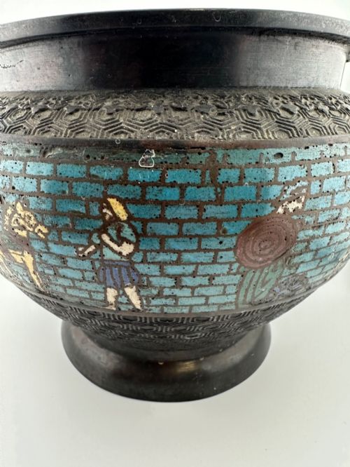 fig 1. A pair of round dark bronze cachepots featuring a wide band of turquoise champleve enamel decorated with Greco-Roman figures.