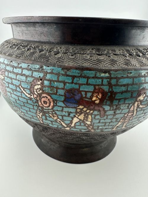 fig 5. A pair of round dark bronze cachepots featuring a wide band of turquoise champleve enamel decorated with Greco-Roman figures.