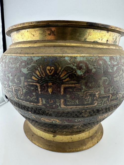 fig 4. A set of three bulbous antique Chinese bronze jardinieres featuring colourful champleve enamel floral decoration around their midsections.
