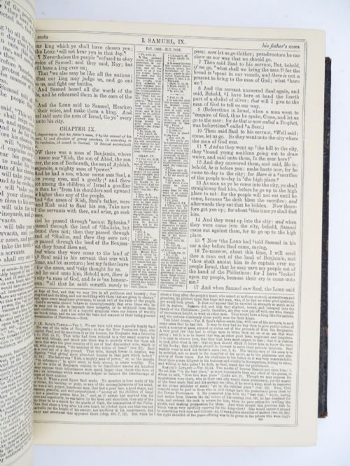 fig 3. A dark leather-bound Victorian Holy Bible featuring gilt lettering inside a star-shaped frame and decorative brass corner mounts.