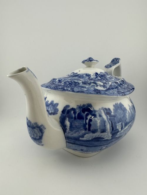 fig 1. An antique blue and white transferware ceramic teapot in the Copeland Spode Blue Italian pattern featuring an Egyptian shape profile.
