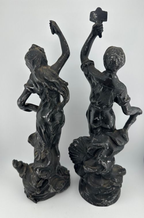 fig 2. A pair of dark bronze-finished French spelter allegorical figures raised on moulded circular bases representing Mutualite and Paix.
