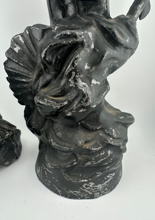 fig 4. A pair of dark bronze-finished French spelter allegorical figures raised on moulded circular bases representing Mutualite and Paix.