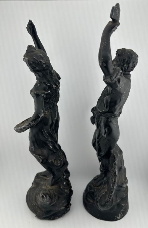 fig 5. A pair of dark bronze-finished French spelter allegorical figures raised on moulded circular bases representing Mutualite and Paix.
