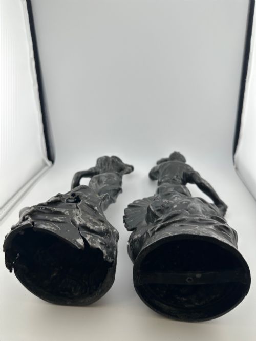 fig 7. A pair of dark bronze-finished French spelter allegorical figures raised on moulded circular bases representing Mutualite and Paix.