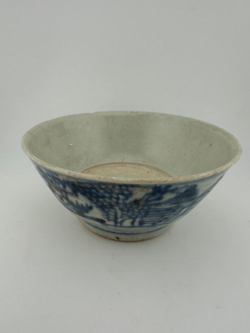 fig 1. A nineteenth century Chinese Qing Dynasty shipwreck porcelain bowl decorated with cobalt blue underglaze landscape imagery.