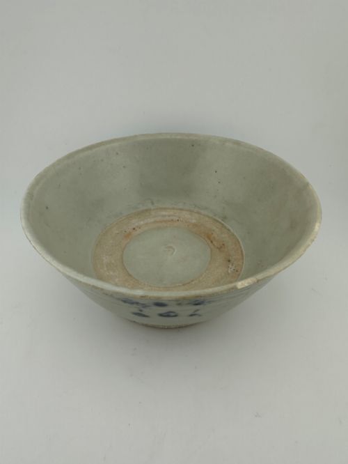 fig 3. A nineteenth century Chinese Qing Dynasty shipwreck porcelain bowl decorated with cobalt blue underglaze landscape imagery.