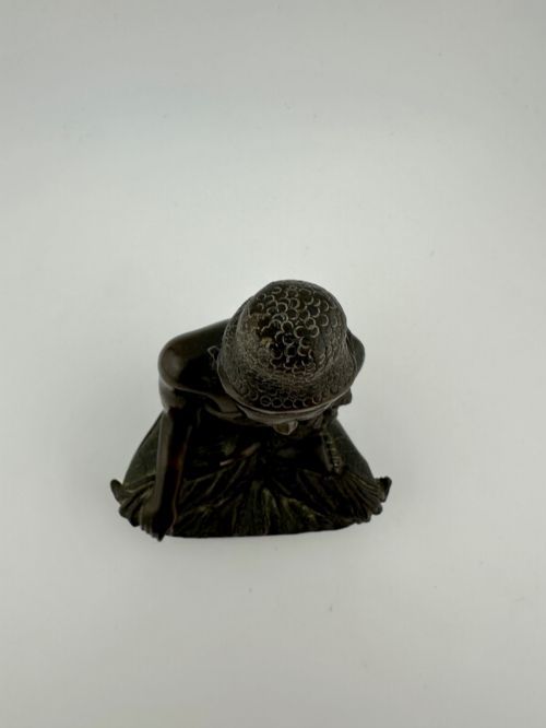 fig 9. A 19th-century Burmese cast bronze figure of Shakyamuni Buddha seated cross-legged in the Bhumisparsha mudra position.