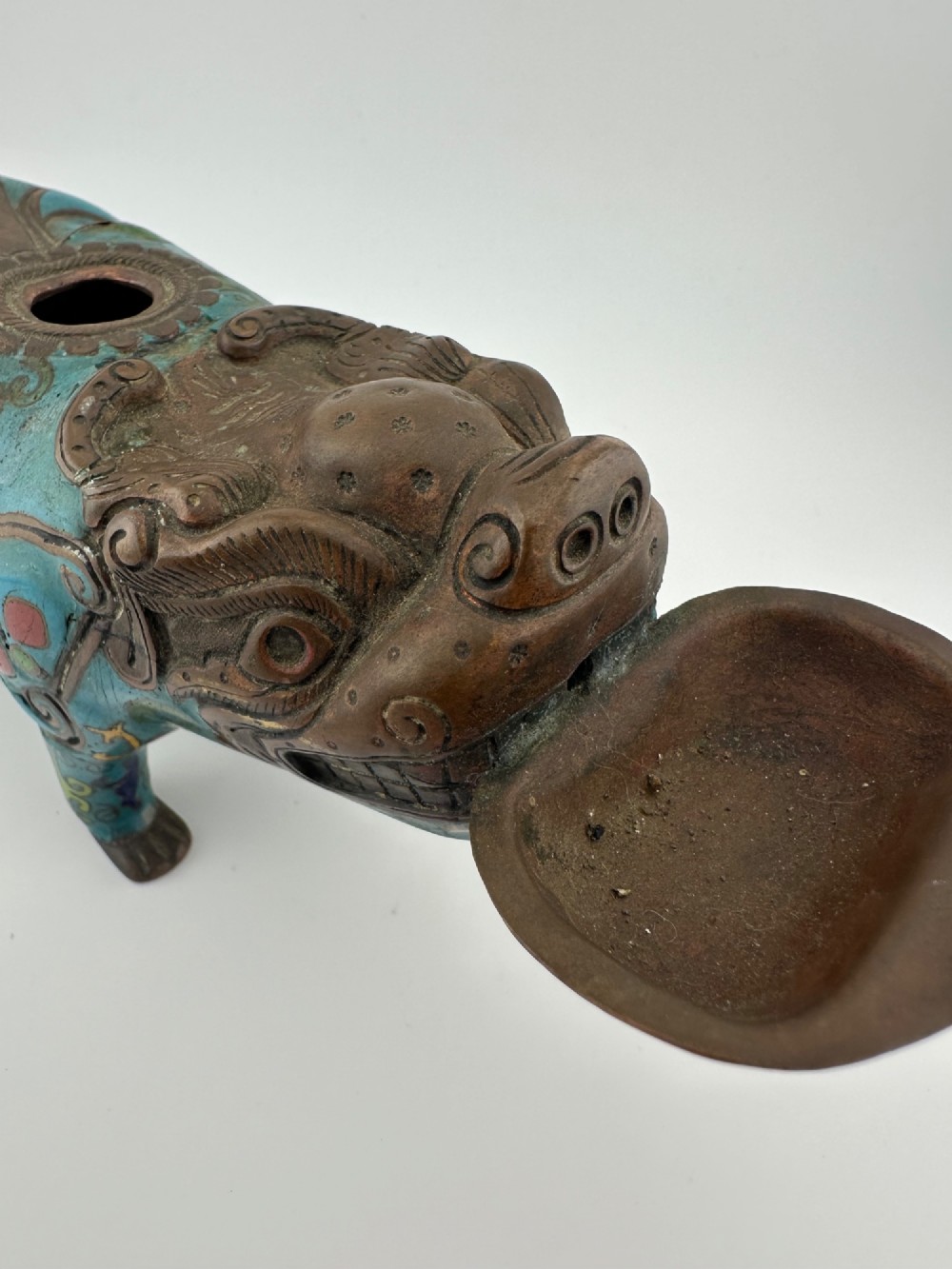 An antique Chinese bronze censer shaped as a mythical beast decorated with turquoise cloisonne enamel and colourful scrollwork. View IX