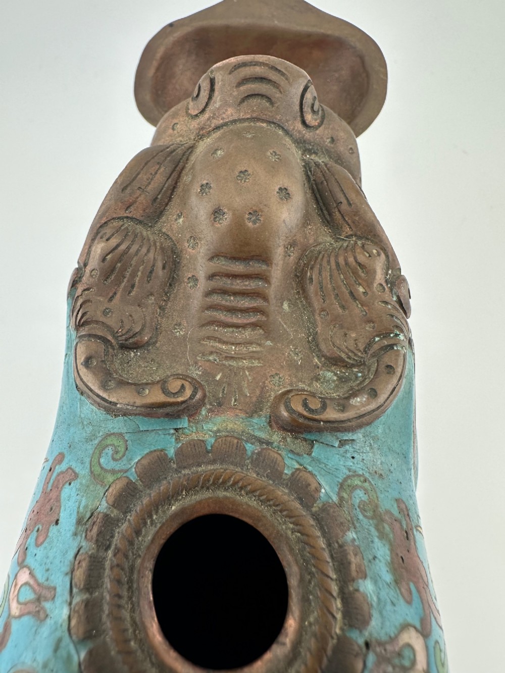 An antique Chinese bronze censer shaped as a mythical beast decorated with turquoise cloisonne enamel and colourful scrollwork. View XI