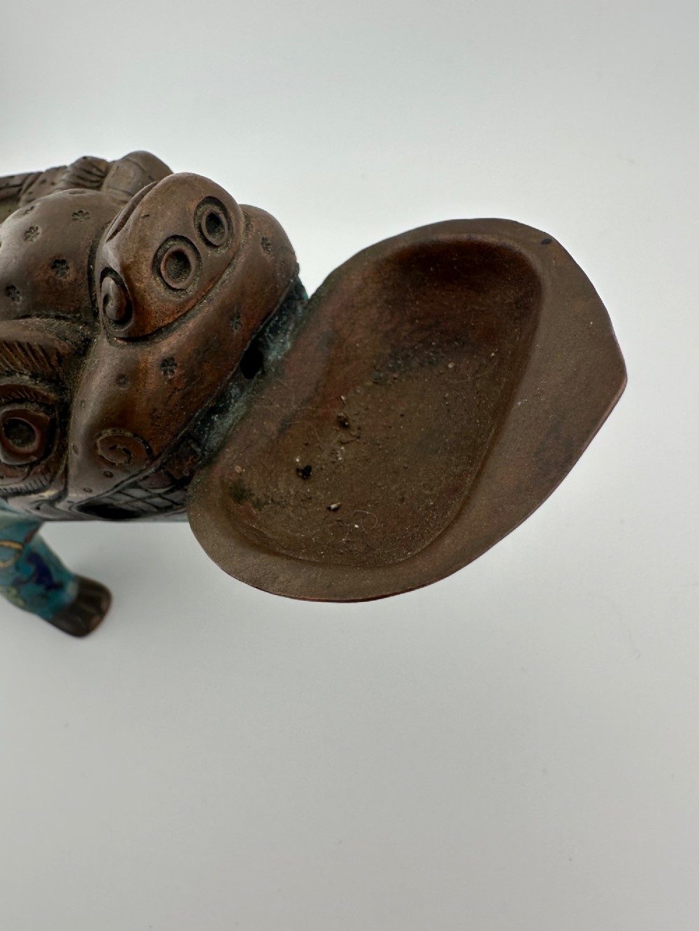 An antique Chinese bronze censer shaped as a mythical beast decorated with turquoise cloisonne enamel and colourful scrollwork. View XII