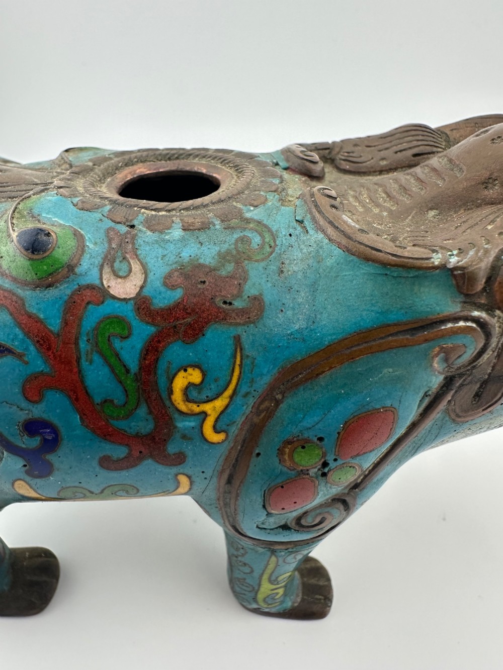 An antique Chinese bronze censer shaped as a mythical beast decorated with turquoise cloisonne enamel and colourful scrollwork. View XIII