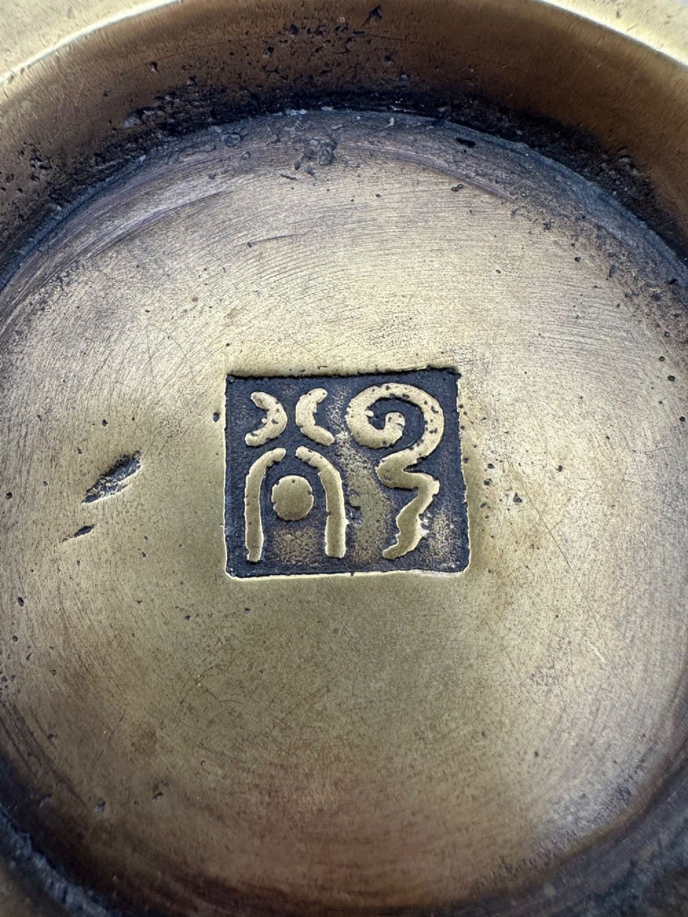 An antique gilded bronze Chinese censer featuring hardstone and jade cabochon inlays, beast-head handles, a pierced cover, and a matching carved stand. View XII