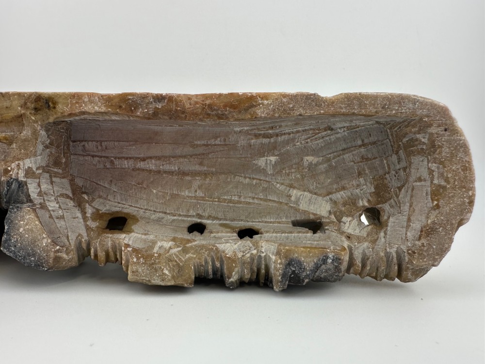 An antique Chinese carved soapstone double brush washer featuring two vessel shapes supported by carved animals and pierced rockwork in shades of mottled green, cream, and dark grey. View X